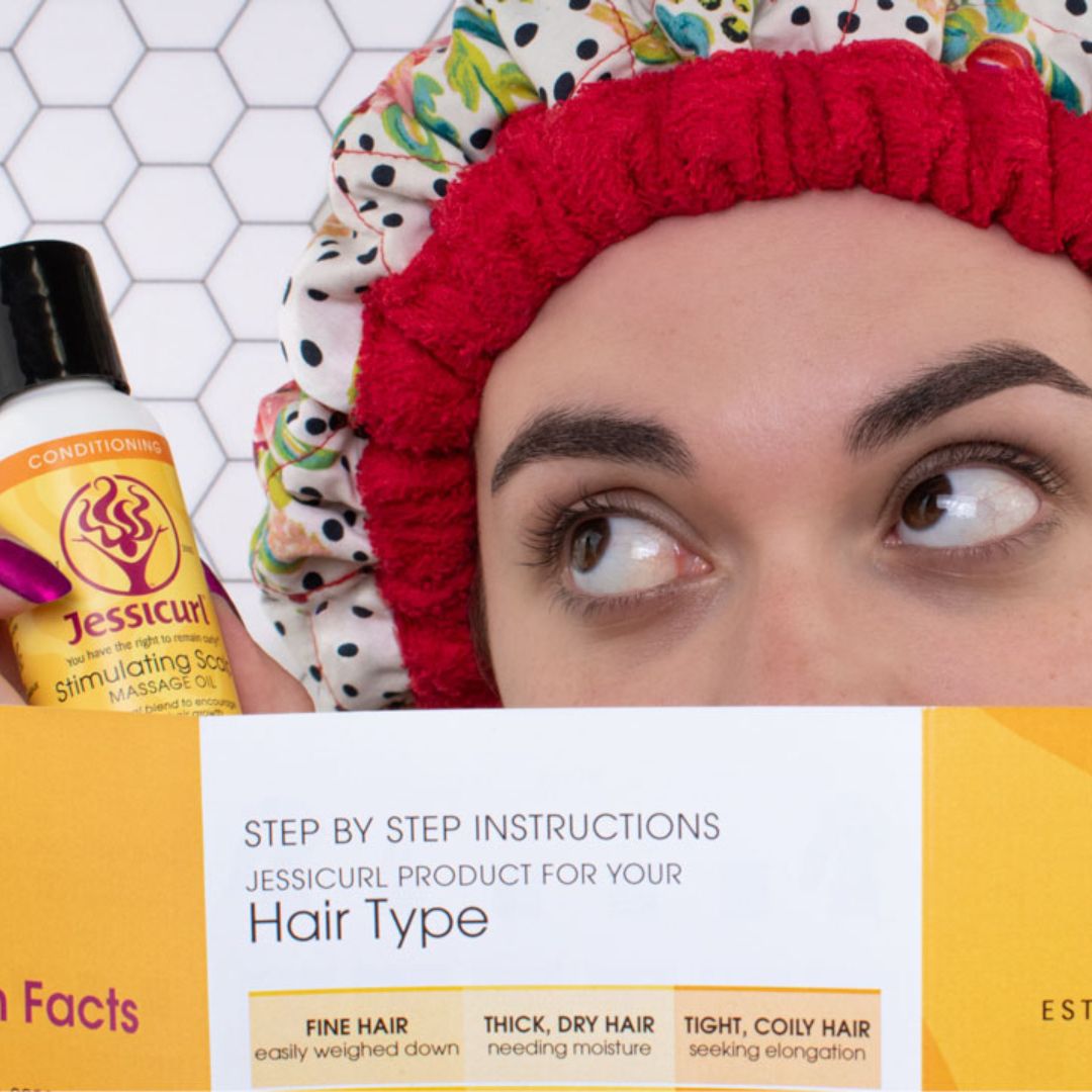 woman in heat camp with pamphlet covering half her face holding and looking at a bottle of product