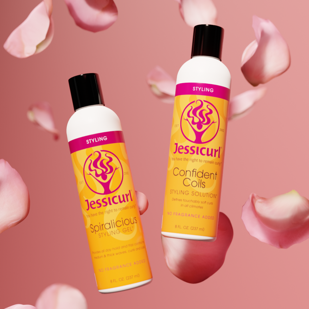 bottles of Jessicurl Spiralicious Styling Gel and Confident Coils Styling Solution floating amongst pink flower petals with a different pink colored background