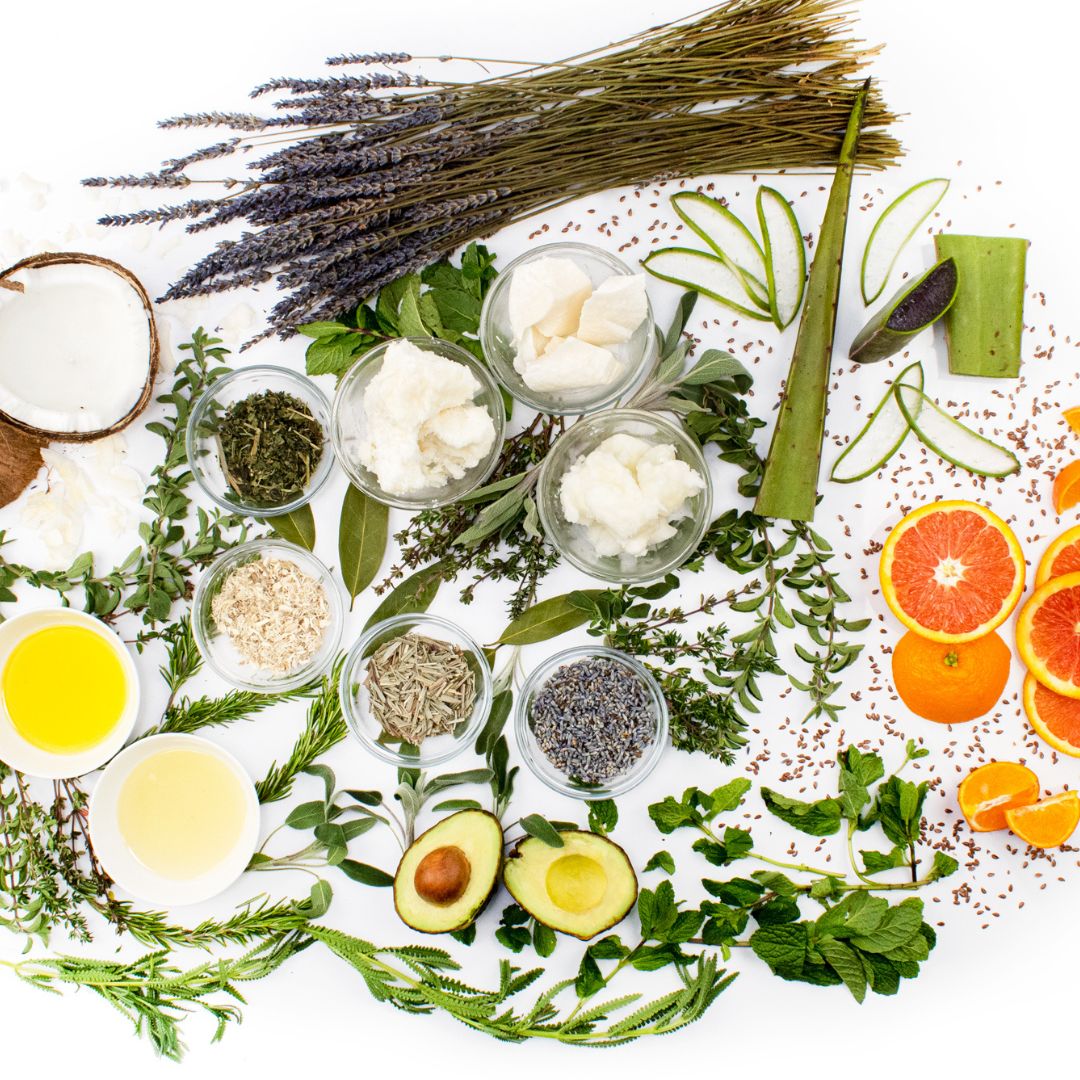 a variety of ingredients used in Jessicurl products, including shea butter, lavender, oranges, avocados, herbs, oils, and coconuts