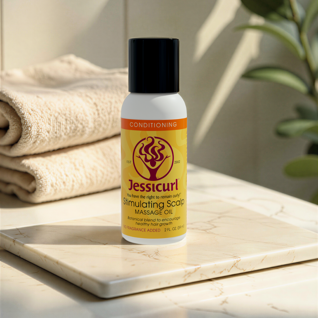 bottle of Jessicurl Stimulating Scalp Massage Oil sitting ona tile ina spa with towels and plants in the background